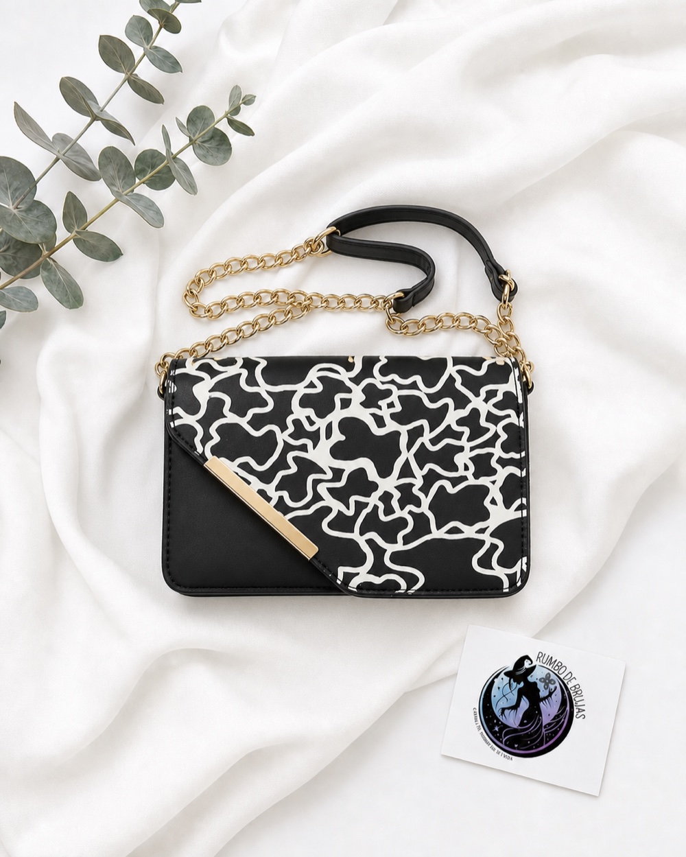 Bolso de fiesta negro y blanco con cadena dorada — Rumbo de Brujas