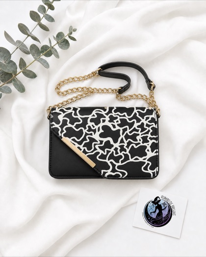 Bolso de fiesta negro y blanco con cadena dorada — Rumbo de Brujas