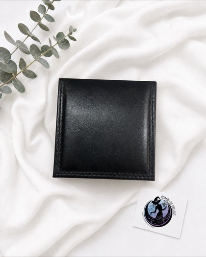 Cartera negra de caballero — Rumbo de Brujas