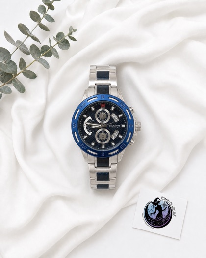 Reloj azul y plateado con gemelos — Rumbo de Brujas